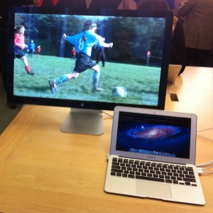 Photo of a 27 inch external screen being used by a mid-2011 MacBook Air i5 11 inch model